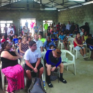 Brazilians worship alongside the mission team that built the church building. Teams worked to build three churches during the week they were in the area. Submitted photo.