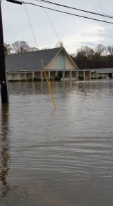 Floodwaters surround Ford Park Baptist Church in Shreveport.