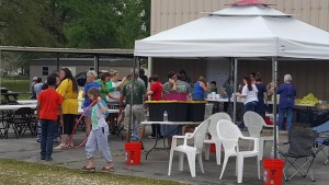 Members of Starks Baptist Church serve evacuees after flooding hit the area.