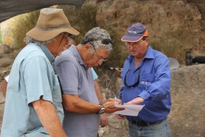 Dr. Dan Warner, Tsvika Tsuk and Eli Yannai talking about the excavation.