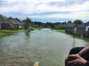 A view of a flooded street where the Phillips family live. Lane Corley photo