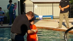 Brothers led to Christ at Boys Camp at Clara Springs Baptist Encampment are baptized.