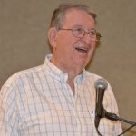 Don Mabry, former Louisiana Baptist Convention missions and ministry director, welcomes former Louisiana Baptist directors of missions to their reunion at the Baptist Building.