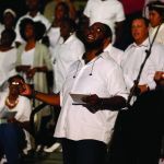 The combined mass choir of area churches lead worship during the opening night of the Hope4U GO TELL Crusade.