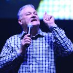 Scott Camp challenges the crowd to give up their idols and follow Christ during the Oct. 16 session.