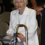 A woman relaxes before the final night of the Tomorrow's Hope GO TELL Crusade begins. Doug Collier photo