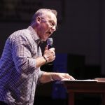 Evangelist Rick Gage encourages students to turn to Christ before it is too late. Doug Collier photo