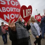 Right to life supporters march across the Long-Allen Bridge between Shreveport and Bossier City during the Louisiana Life North.