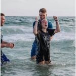 This high school student was excited to participate in a beach side baptism service in Panama City, Florida.