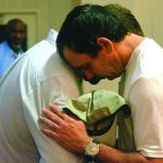 During the final moments of a revival at the Louisiana State Penitentiary at Angola, inmates came forward during a time of decision. One of the prisoners ask to pray with Jamie Dew, president of New Orleans Baptist Theological Seminary.