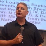 Keith Manuel, evangelism and church growth team director for Louisiana Baptists, thanks the inmates who attended a revival September 19 on the grounds of the Louisiana State Penitentiary at Angola.